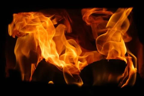 Fire flames on black background. Abstract blaze fire flame texture for bann.. Stockfoto's