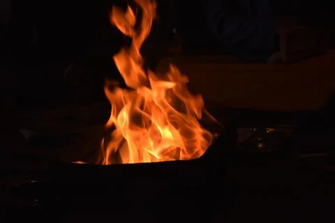 Fire flames on black background also known as Hawan Kund in India Stock Photos