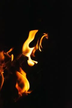 Fire flames on black background. Blaze flames background. Stock Photos