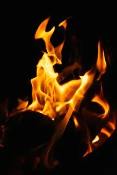 Fire flames on black background. Blaze flames background. Stock Photos