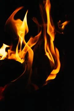 Fire flames on black background. Blaze flames background. Stock Photos