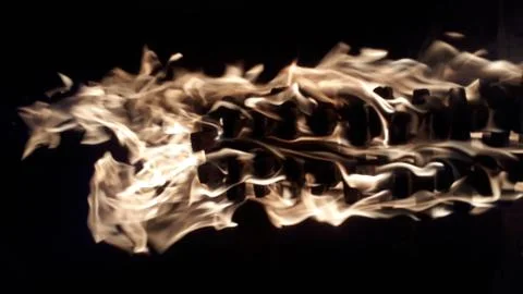 Fire with flames on a black background close up Stock Photos