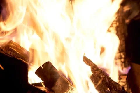 Fire flames on a black background. The fire burns on a black background. Stock Photos