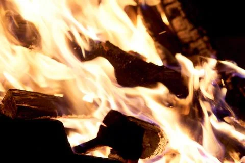 Fire flames on a black background. The fire burns on a black background. Stock Photos