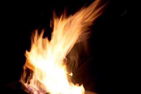 Fire flames on a black background. The fire burns on a black background. Stock Photos