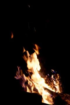 Fire flames on a black background. The fire burns on a black background. Stock Photos