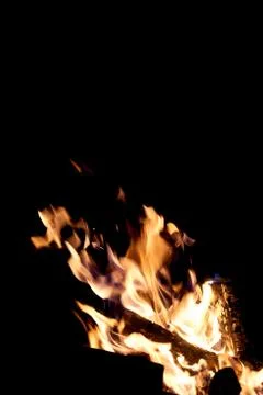 Fire flames on a black background. The fire burns on a black background. Stock Photos