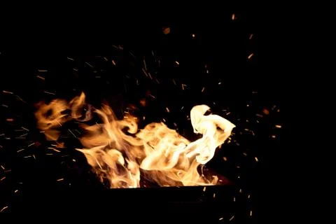 Fire flames on a black background. The fire burns on a black background. Foto stock