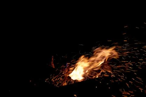 Fire flames on a black background. The fire burns on a black background. Stock Photos