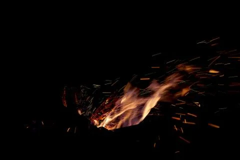 Fire flames on a black background. The fire burns on a black background. Stock Photos