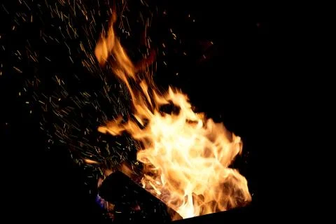 Fire flames on a black background. The fire burns on a black background. Stock Photos