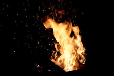 Fire flames on a black background. The fire burns on a black background. Stock Photos