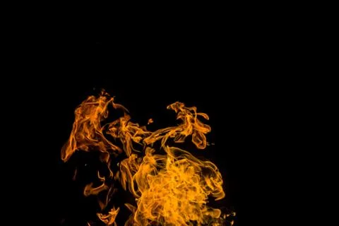 Fire flames on black background. fire on black background isolated. fire patt Stock Photos