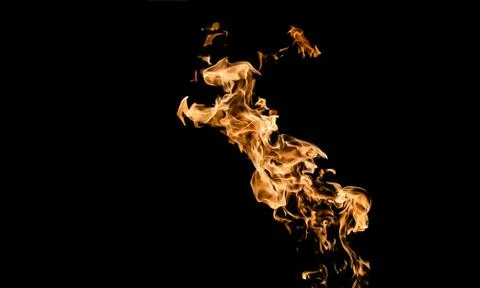 Fire flames on black background. fire on black background isolated. fire patt Stock Photos
