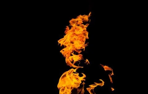 Fire flames on black background. fire on black background isolated. fire patt Stock Photos