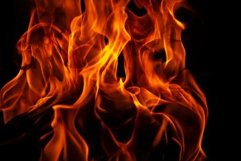 Fire flames on black background. Fire burn flame isolated, abstract texture Stock Photos