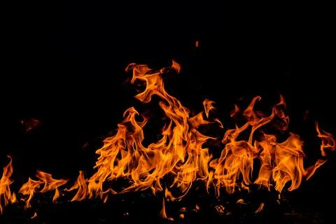 Fire flames on black background. Fire burn flame isolated, abstract texture Stock Photos