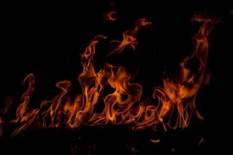 Fire flames on black background. Fire burn flame isolated, abstract texture Stock Photos