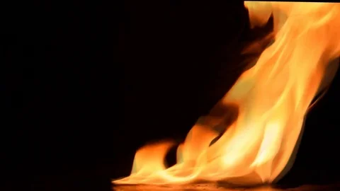 Fire flames on black background Stock Footage 76233906
