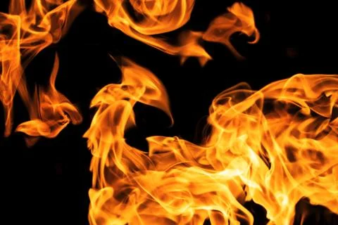 Fire flames on black background isolated. Burning gas or gasoline burns with  Photos