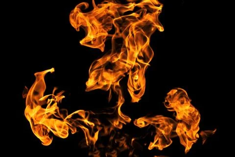 Fire flames on black background isolated. Burning gas or gasoline burns with  Photos