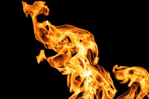 Fire flames on black background isolated. Burning gas or gasoline burns with  库存照片