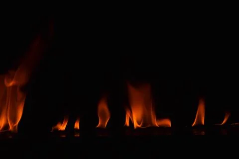 Fire flames on black background Stock Photos