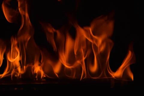 Fire flames on black background Stock Photos