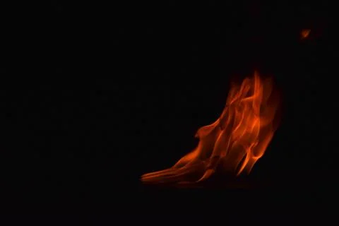 Fire flames on black background Stock Photos