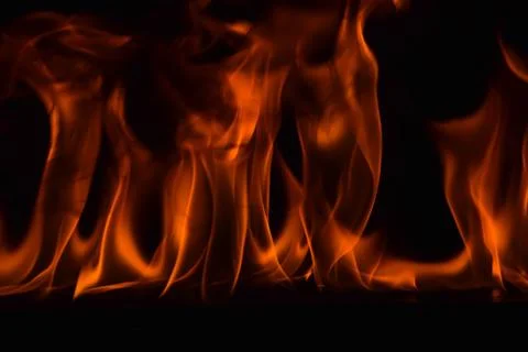 Fire flames on black background Stock Photos