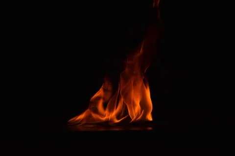 Fire flames on black background Stock Photos