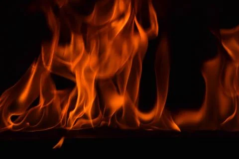 Fire flames on black background Stock Photos