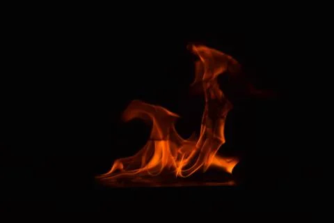 Fire flames on black background Stock Photos