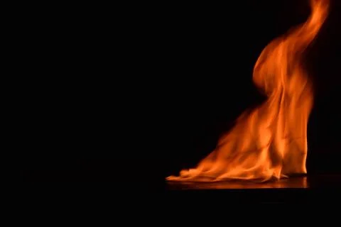 Fire flames on black background Stock Photos