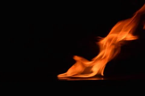 Fire flames on black background Stock Photos