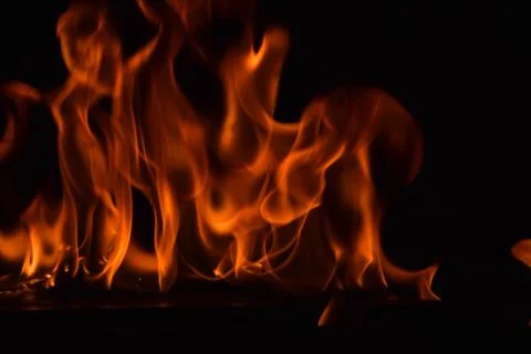 Fire flames on black background Stock Photos