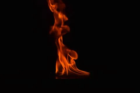 Fire flames on black background Stock Photos