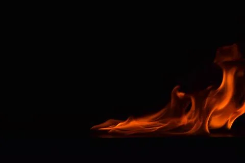 Fire flames on black background Stock Photos