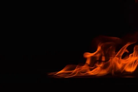 Fire flames on black background Stock Photos