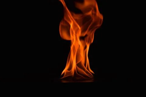 Fire flames on black background Stock Photos