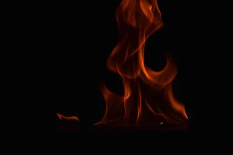 Fire flames on black background Stock Photos