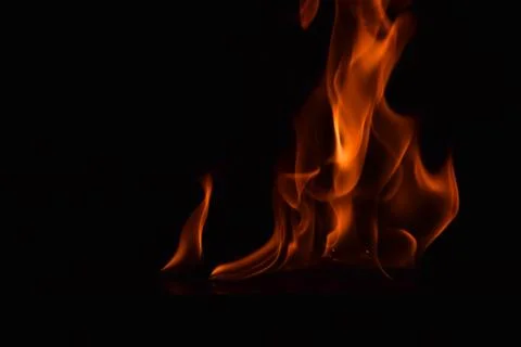 Fire flames on black background Stock Photos