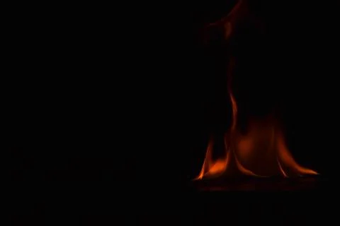 Fire flames on black background Stock Photos