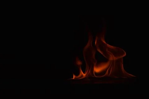 Fire flames on black background Stock Photos