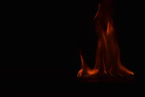 Fire flames on black background Stock Photos