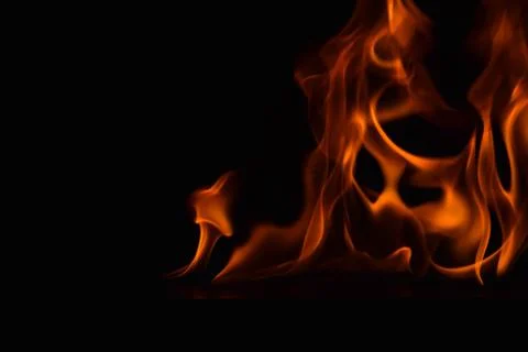 Fire flames on black background Stock Photos
