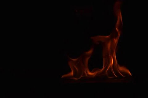 Fire flames on black background Stock Photos