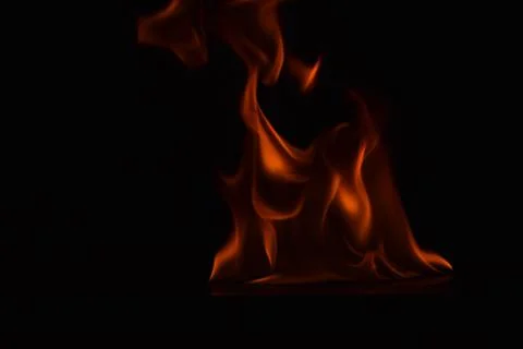 Fire flames on black background Stock Photos