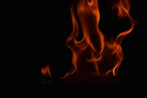 Fire flames on black background Stock Photos