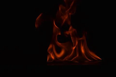 Fire flames on black background Stock Photos